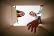 © ivanko80 - Smiling couple unpacking boxes in new home