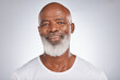 Senior black man, face and self care with skincare, dermatology and cosmetics for clean, glow and fresh skin. Headshot of African male with a beard on grey studio background for beauty spa treatment