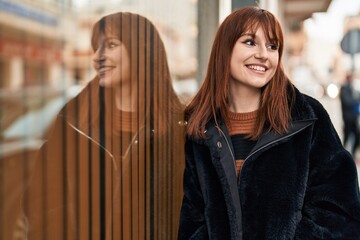 Sticker - Young woman smiling confident standing at street