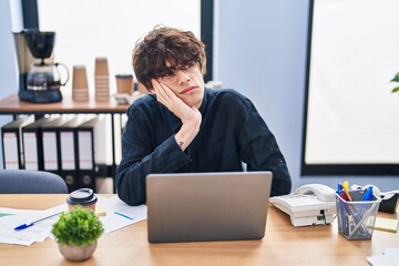 Sticker - Young hispanic man business worker tired using laptop at office