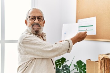 Poster - Senior grey-haired man smiling confident working at office