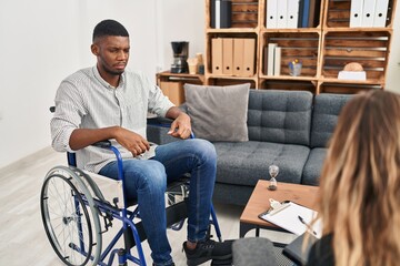 Poster - African american man doing therapy sitting on wheelchair skeptic and nervous, frowning upset because of problem. negative person.