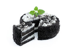 Black Velvet Cake Decorated With White Cream Isolated On White