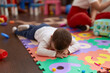 © Krakenimages.com - Adorable toddler lying on floor crying at kindergarten