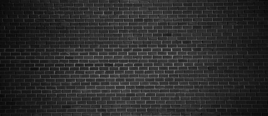 Wall Mural - Rough black brick wall texture or background