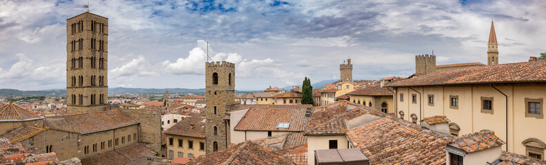 A cloudy day in Arezzo: a view of the city's bell towers, towers, and roofs from the Confraternita dei Laici tower