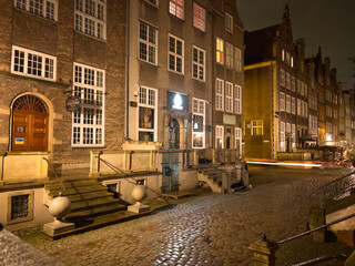 Sticker - View of the street in the center of the old town at night. Architecture of an old historic street in Gdansk. Old town tourist attraction. Gdansk, Poland.