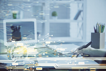 Multi exposure of woman hands on background with technology coding hologram. Data concept.