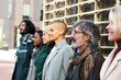 © CarlosBarquero - Diverse group faces of different ages and races with a corporate look. Outdoor portrait of business people. High quality photo