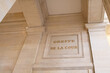 greffe de la cour text on ancient wall facade building means in french justice court clerk of the court courtroom