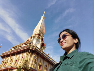 Selfie woman at Wat Chalong, Phuket, Thailand.