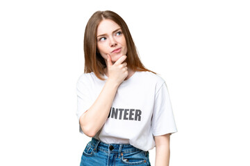 Poster - Young volunteer woman over isolated chroma key background having doubts