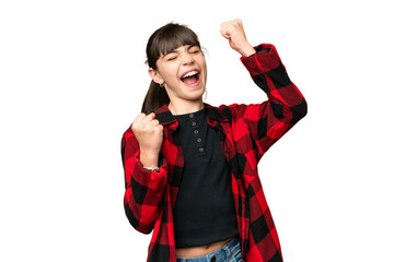 Wall Mural - Little girl over isolated green chroma key background celebrating a victory