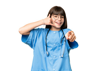 Sticker - Little girl as a surgeon doctor over isolated chroma key background making phone gesture and pointing front