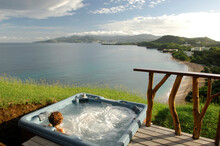 Woman In A Jacuzzi On The Caribbean Island Of Grenada.