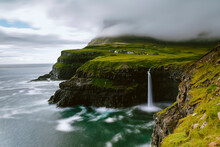 Waterfall On Cliff On Seashore, Gasadalur, Vagar, Faroe Islands