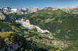 Aerial view of Lauterbrunnen valley with mountain peaks in the Swiss Alps on a sunny summer day