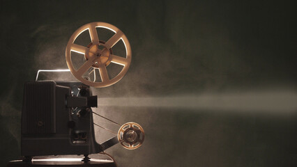 Old retro film projector light beam in the dark