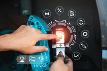 Wall Mural - Car service and maintenance concept with customer service icon, Serviceman holding part of car brake system and showing basic maintenance icon and warranty after service with brake calliper background