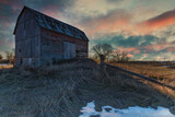 Fototapeta Na ścianę - Rural winter landscapes and scenics from Ontario Canada near Kingston Ontario.  Featuring long exposures, farms and old barns with stunning moody skies