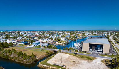 Fototapete - Hernando Beach Florida Homes Aerial Drone Image Florida Sunshine And Big Blue Sky