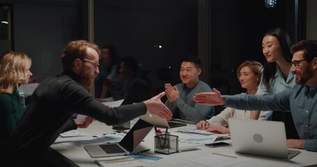 People business partners having a good deal during a conference in the office