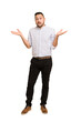 © Asier - Full body adult latin man cut out isolated confused and doubtful shrugging shoulders to hold a copy space.