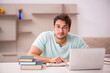 © Elnur - Young male student preparing for exams at home