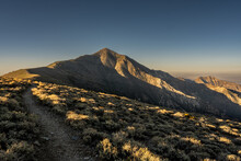 Sunlight Begins To Break Over Ridge On Telescope In Death Valley