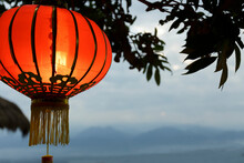 Illuminated Chinese Lantern Against Sky