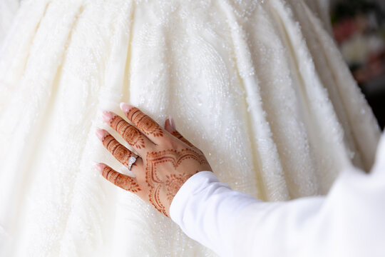 Afghani bride's wedding outfit white dress