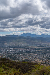  Beautiful view of the large Mexican city of Oaxaca from Monte Alban. View of the endless mountain peaks.