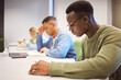 © S Fanti/peopleimages.com - Black man, students and studying for education, knowledge and focus for exams, campus and intelligent. African American male, student and young people on university, concentration and research notes