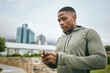 © S Fanti/peopleimages.com - Fitness, phone or black man on social media in city to relax in training, exercise or workout with in New York. Social networking, wellness or healthy athlete texting, chat or typing online on break