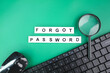 © Fauzi - mouse, laptop keyboard and magnifying glass with alphabet letters of the word forgot password. the concept of forgotten password. the concept of inaccessibility