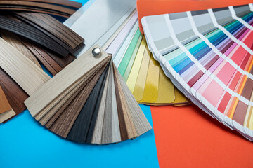 Wall Mural - different sepmler color palettes arranged with a fan on the table isolated.