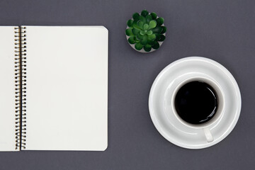 Wall Mural - Blank notepad and coffee cup, conceptual minimalism.