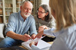 © Robert Kneschke - Seniors sign a contract or power of attorney