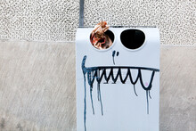 A Comically Painted Face On A Garbage Can, Wroclaw, Poland.