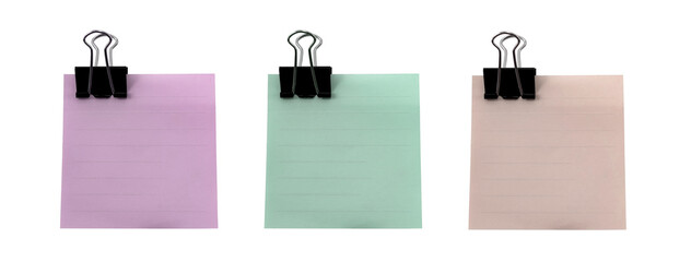 Paper clip on colored paper for notes and records. Stationery items for the office