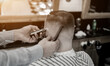 © jozzeppe777 - hands of barber making haircut