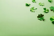 St. patrick's day. green background with clover leaves: shamrock and four-leafed. copy space. Paper craft