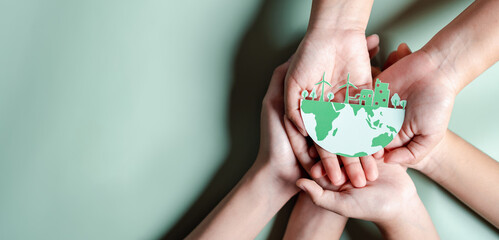 Hands together holding ESG Environmental, environmental, social, and governance in sustainable and ethical business on the Network connection.