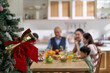 © imtmphoto - three generation asian family eating meal on christmas day