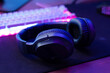 © ADDICTIVE STOCK - Modern wireless headphones on table