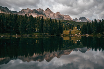 lake in the dolomites on a summer cloudy day