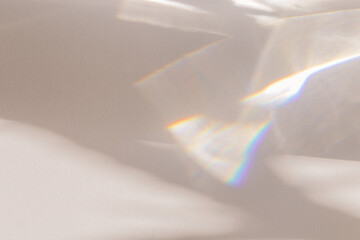 sunlight background, abstract photo with light and shadow, glare and shine on paper texture, rainbow