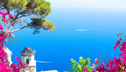 Canvas Print - Belltower in Ravello village with sea view with flowers, Amalfi coast of Italy