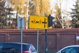 Fototapeta  - Znak uliczny roboty drogowe. Znak uliczny zwężenie. Znak drogowy podczas prac remontowych