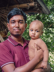 Sticker - South asian little kid enjoying with his uncle , young boy holding his nephew in arm 